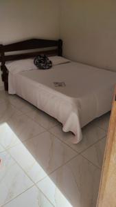 Postel nebo postele na pokoji v ubytování Pousada & Camping Recanto dos Anjos Azuis