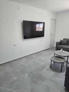 TV a/nebo společenská místnost v ubytování Royal Magic + 19 fotografií