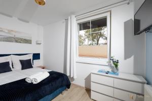 Postel nebo postele na pokoji v ubytování Villa Ula