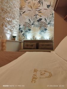 Postel nebo postele na pokoji v ubytování Alle Volte Petite Maison