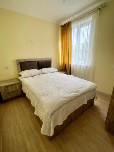 Postel nebo postele na pokoji v ubytování Guest House