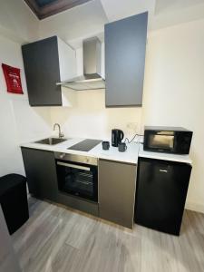 Η κουζίνα ή μικρή κουζίνα στο Studio Near London Eye