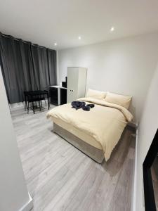 Postel nebo postele na pokoji v ubytování Studio Near London Big Ben