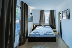 Postel nebo postele na pokoji v ubytování Kadiyata Guest House