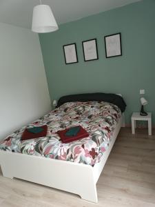 Postel nebo postele na pokoji v ubytování Gîte à Travers champs
