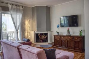 TV a/nebo společenská místnost v ubytování Maria's House