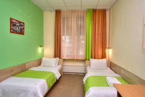 Posteľ alebo postele v izbe v ubytovaní Hostel Podolski Plus