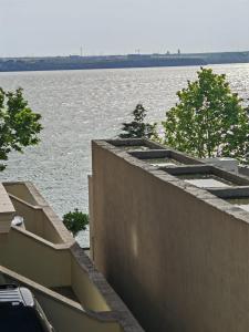 a view of a large body of water at Apartments in Solid House Mamaia in Mamaia