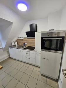 Una cocina o cocineta en Emmi