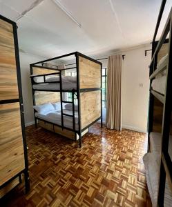 A bed or beds in a room at The Library Hostel