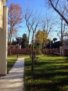 A garden outside Villa delle Rose