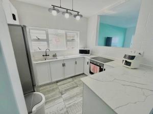 Η κουζίνα ή μικρή κουζίνα στο Umdloti Paradise