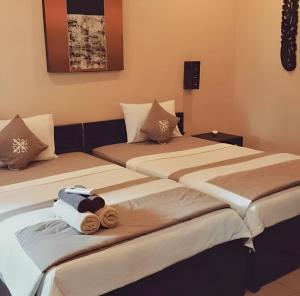 Postel nebo postele na pokoji v ubytování Zoé Bungalows