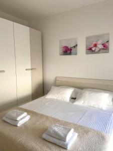 Postel nebo postele na pokoji v ubytování Apartmani Villa Adriatic