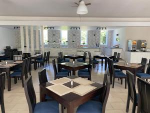 Ресторан / й інші заклади харчування у Vezhen Hotel - Free Parking