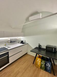 Köök või kööginurk majutusasutuses Le Stanze Del Savonarola