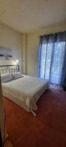 Postel nebo postele na pokoji v ubytování Villa Bianca