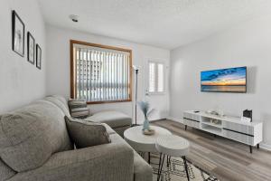 a living room with a couch and a table at Sunny Beach Condo 2 BR 1 Bath in Wildwood