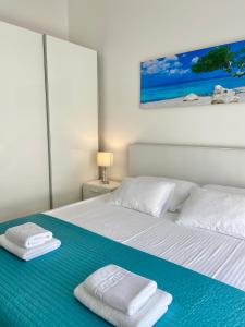 Postel nebo postele na pokoji v ubytování Apartmani Villa Adriatic