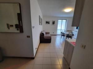 a living room with a couch and a table at 200 passi in Cannero Riviera