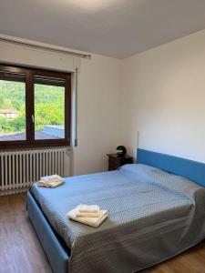 Postel nebo postele na pokoji v ubytování Casa Nello