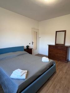 Postel nebo postele na pokoji v ubytování Casa Nello