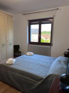 Postel nebo postele na pokoji v ubytování Casa Nello