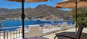 a balcony with a view of a body of water at Xylokeratidi Sea View Family Studio in Rakhídhion