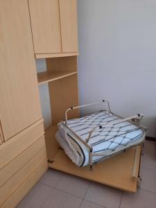 a bed in a cabinet with towels in a room at 200 passi in Cannero Riviera +26 photos