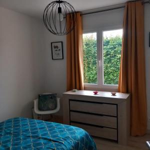 Postel nebo postele na pokoji v ubytování Chambre tout confort