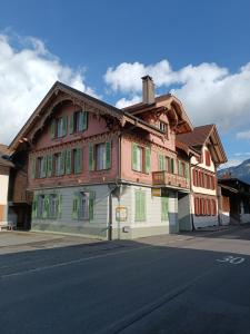a building on the side of a street at Apartment Jolie in Interlaken
