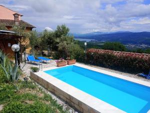 The swimming pool at or close to Il Podere di Massi