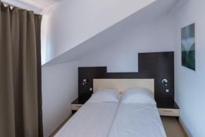 Postel nebo postele na pokoji v ubytování Kadiyata Guest House