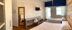 Posteľ alebo postele v izbe v ubytovaní Hotel Diplomatic