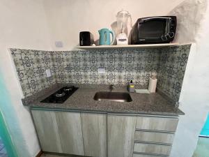 Kuchyň nebo kuchyňský kout v ubytování El Campito Cabaña de montaña