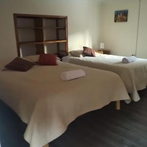 Postel nebo postele na pokoji v ubytování Casablanca Hotel Restobar