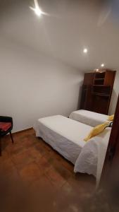Ένα ή περισσότερα κρεβάτια σε δωμάτιο στο Casa cheve