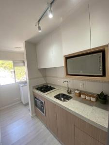 Kuchyň nebo kuchyňský kout v ubytování Apartamento em Blumenau + 5 fotografií