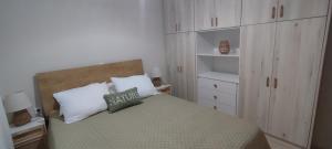 Postel nebo postele na pokoji v ubytování VeVou Apartment