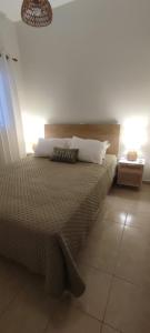 Postel nebo postele na pokoji v ubytování VeVou Apartment