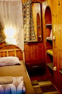 a small room with a bed and bunk beds at u6 Schöpfwerk hostel 002 in Vienna