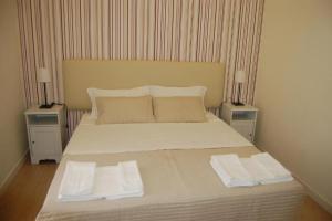 Postel nebo postele na pokoji v ubytování Reggio Centro B&B