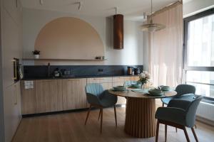 Kuchyňa alebo kuchynka v ubytovaní Doki STARling Apartment