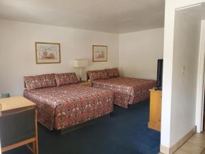 Postel nebo postele na pokoji v ubytování Budget Inn Durango