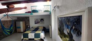 Ένα ή περισσότερα κρεβάτια σε δωμάτιο στο Casa Colore