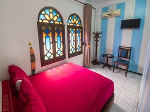 Кровать или кровати в номере Hotel Sevilla