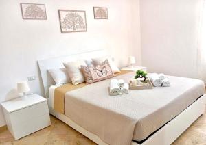 Letto o letti in una camera di Home Sisters