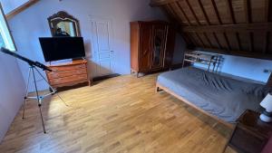 Postel nebo postele na pokoji v ubytování Corps de ferme bourguignon