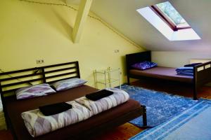 Postel nebo postele na pokoji v ubytování U6 Schöpfwerk Hostel 11