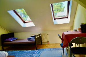 Postel nebo postele na pokoji v ubytování U6 Schöpfwerk Hostel 11